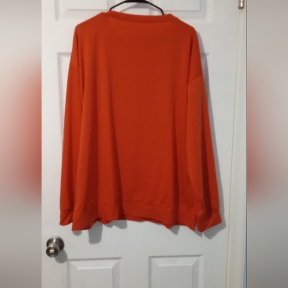 Vibrant Orange Long Sleeve Top with Graphic Design - Picture 4 of 5